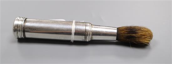 A Victorian silver travelling shaving brush, London, 1890 (cap missing),